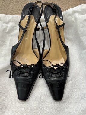 CHANEL Black Leather Pointed Slingback Heels with Bow Detail